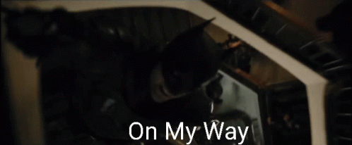 A Black And White Photo Of A Man With The Words On My Way Below Him GIF