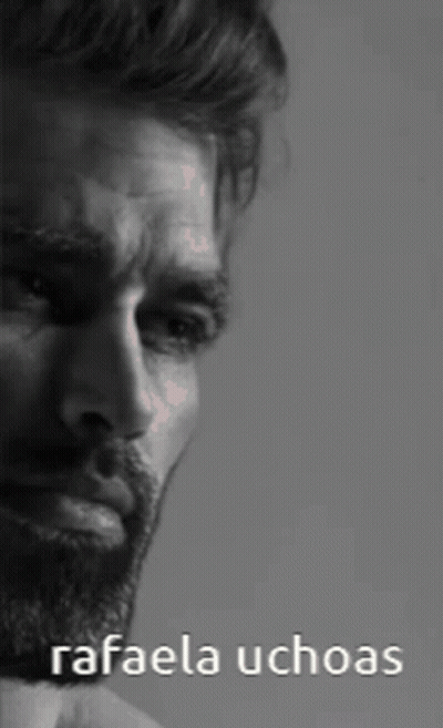 A Black And White Photo Of A Man With The Words Rafaela Uchoas Below Him GIF