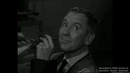 A Black And White Photo Of A Man With The Words Recorded In Free Version Of Icecream Screen Recorder On The Bottom GIF