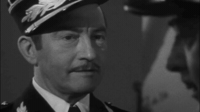 A Black And White Photo Of A Man With The Words Round Up The Usual Suspects On The Bottom GIF