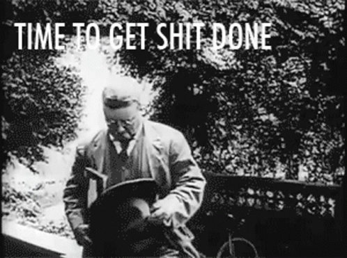 A Black And White Photo Of A Man With The Words Time To Get Shit Done Written Above Him GIF