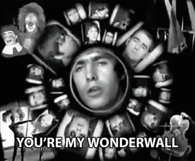 A Black And White Photo Of A Man With The Words " You 'Re My Wonderwall " At The Bottom GIF