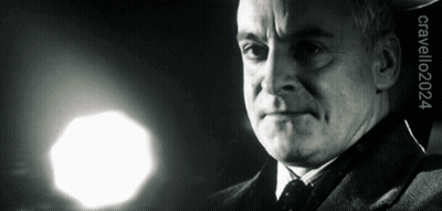 A Black And White Photo Of A Man With The Year 2004 On The Bottom Right GIF