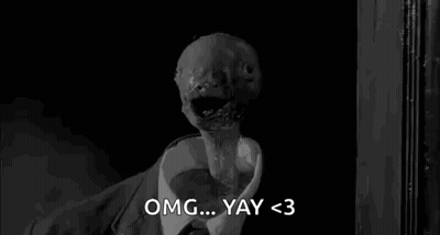 A Black And White Photo Of A Monster In A Suit And Tie Saying Omg ... Yay < 3 . GIF