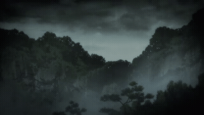 A Black And White Photo Of A Mountain Range With Trees GIF