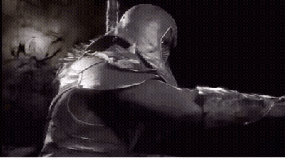 A Black And White Photo Of A Ninja With A Sword . GIF