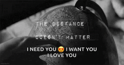 A Black And White Photo Of A Person Holding A Globe With The Words I Need You I Want You I Love You On It GIF