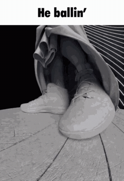 A Black And White Photo Of A Person 'S Feet With The Words He Ballin ' On Top GIF