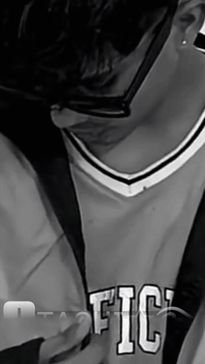 A Black And White Photo Of A Person Wearing A Jersey That Says Fic GIF