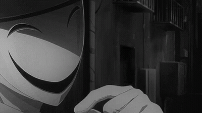 A Black And White Photo Of A Person Wearing A Mask With A Smiley Face . GIF