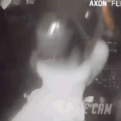 A Black And White Photo Of A Person With The Word Cam On The Bottom Left GIF