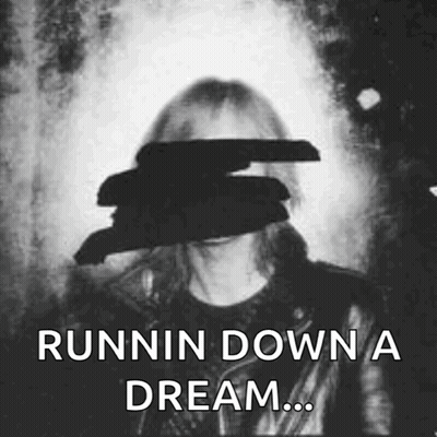 A Black And White Photo Of A Person With The Words Runnin Down A Dream Written On It GIF