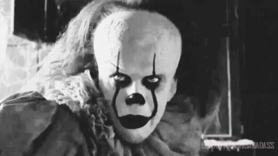A Black And White Photo Of A Scary Clown From It GIF
