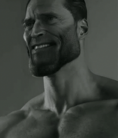 A Black And White Photo Of A Shirtless Man With A Beard GIF