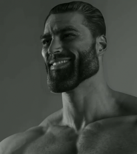 A Black And White Photo Of A Shirtless Man With A Beard Smiling GIF