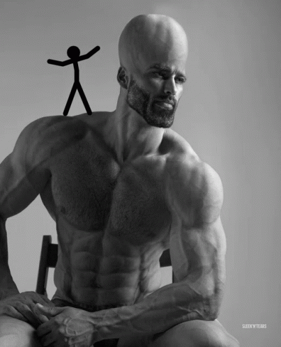 A Black And White Photo Of A Shirtless Man With A Stick Figure On His Head GIF