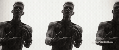 A Black And White Photo Of A Shirtless Man With A Worldstarhiphop.com Logo GIF
