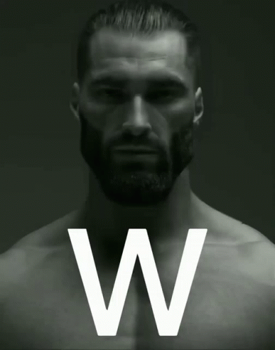 A Black And White Photo Of A Shirtless Man With The Letter W In The Corner GIF