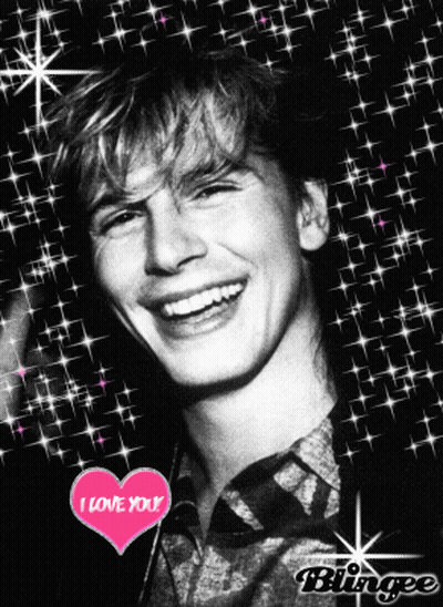 A Black And White Photo Of A Smiling Man With A Heart That Says I Love You GIF