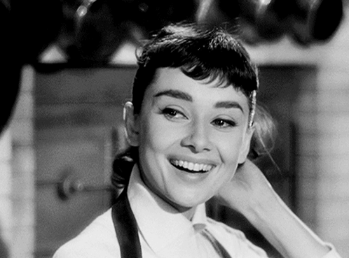 Black And White Photo Of Smiling Young Woman GIF