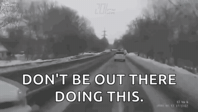 A Black And White Photo Of A Snowy Road With The Words " Don T Be Out There Doing This " GIF