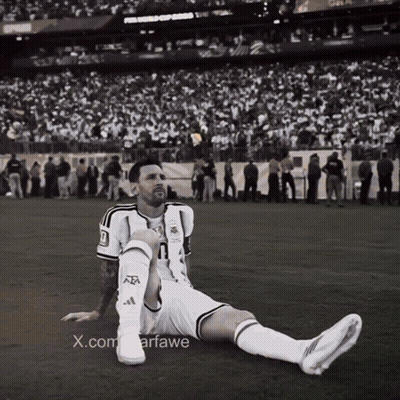 A Black And White Photo Of A Soccer Player With The X.com Watermark GIF