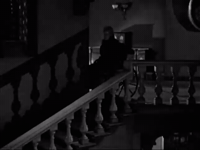 A Black And White Photo Of A Staircase With A Horse Drawn Carriage In The Background . GIF
