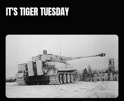 A Black And White Photo Of A Tank With The Words It 'S Tiger Tuesday GIF