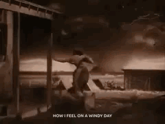 A Black And White Photo Of A Tornado Behind A Wooden Fence With The Words `` How I Feel On A Windy Day '' GIF