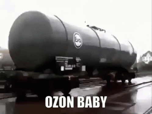 A Black And White Photo Of A Train With The Words `` Ozon Baby '' On It . GIF