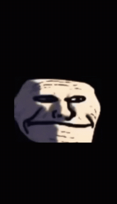 A Black And White Photo Of A Troll Face With A Smile On It . GIF