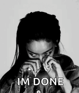 A Black And White Photo Of A Woman Covering Her Face With Her Hands And The Words `` I 'M Done '' Above Her . GIF