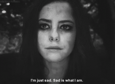 A Black And White Photo Of A Woman Crying With The Words I 'M Just Sad Sad Is What I Am GIF