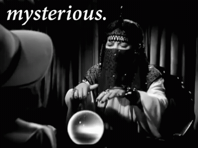 A Black And White Photo Of A Woman Holding A Crystal Ball With The Word Mysterious Written Above Her GIF