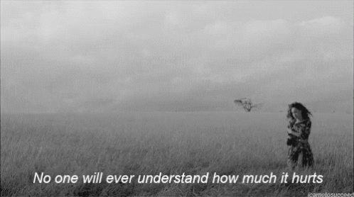 A Black And White Photo Of A Woman In A Field With A Quote . GIF