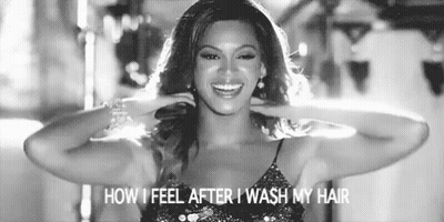 A Black And White Photo Of A Woman In A Sequined Dress . GIF