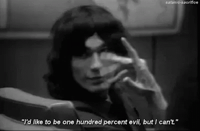 A Black And White Photo Of A Woman Making A Hand Gesture And A Quote . GIF
