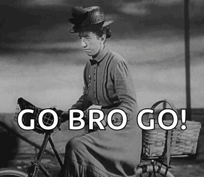 A Black And White Photo Of A Woman Riding A Bike With The Words Go Bro Go Written On It GIF