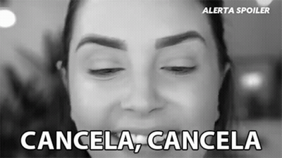 A Black And White Photo Of A Woman 'S Face With The Words Cancela Cancela Below It GIF