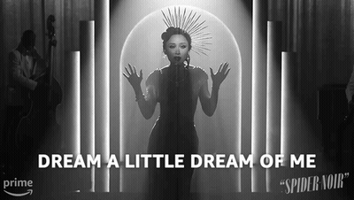 a black and white photo of a woman singing with the words " dream a little dream of me " below her