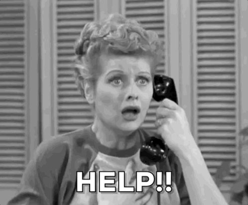 A Black And White Photo Of A Woman Talking On A Telephone And Asking For Help . GIF