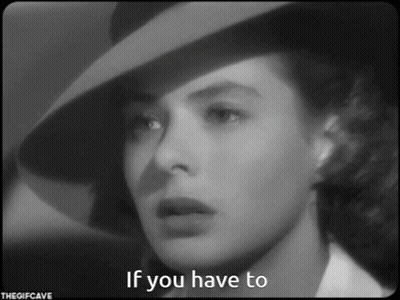 A Black And White Photo Of A Woman Wearing A Hat With The Caption If You Have To GIF