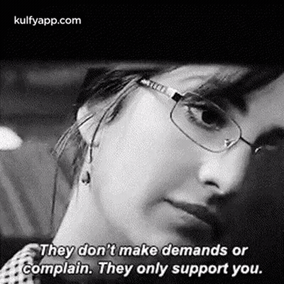 A Black And White Photo Of A Woman Wearing Glasses And Saying `` They Don 'T Make Demands Or Complain . '' GIF