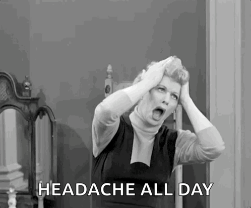 A Black And White Photo Of A Woman With A Headache . GIF