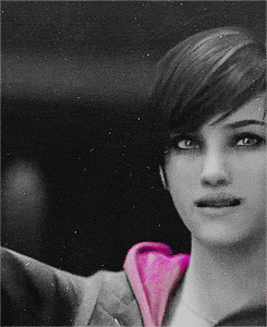 A Black And White Photo Of A Woman With A Pink Heart On Her Shirt GIF