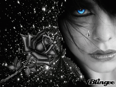 A Black And White Photo Of A Woman With A Rose And A Tear Coming Out Of Her Eye GIF