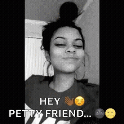 A Black And White Photo Of A Woman With Her Eyes Closed And A Bun On Her Head . GIF