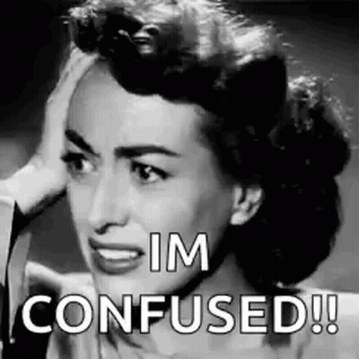 A Black And White Photo Of A Woman With Her Hand On Her Head And The Words `` Im Confused ! '' GIF