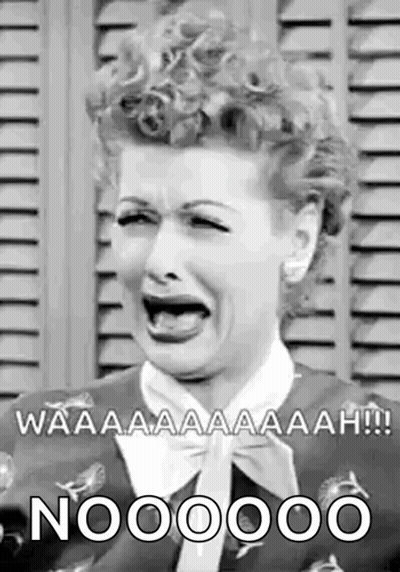 A Black And White Photo Of A Woman With Her Mouth Open . GIF