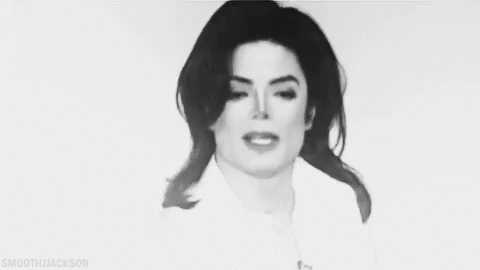 A Black And White Photo Of A Woman With Smooth Jackson Written Below Her GIF